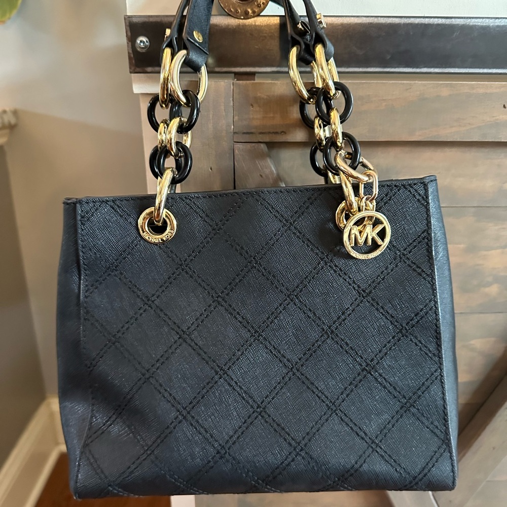 Michael Kors black purse.